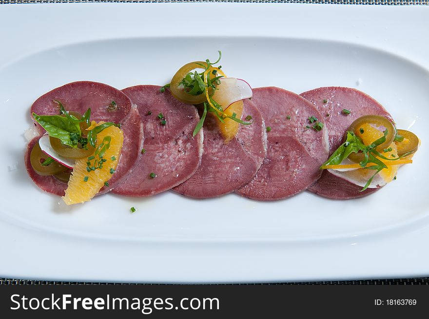 Braised cow tongue with jalapeno peppers