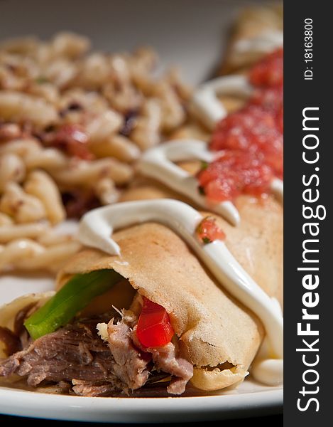 Chipotle pork and pepper crepe with macaroni and cheese