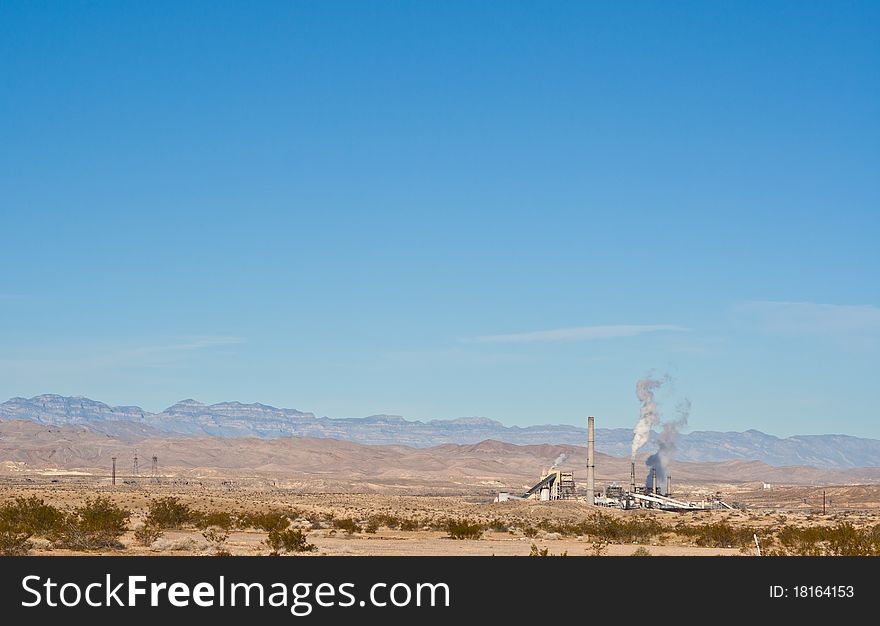 A beautiful sharp landscape picture of the Nevada Desert and A Power Plant.