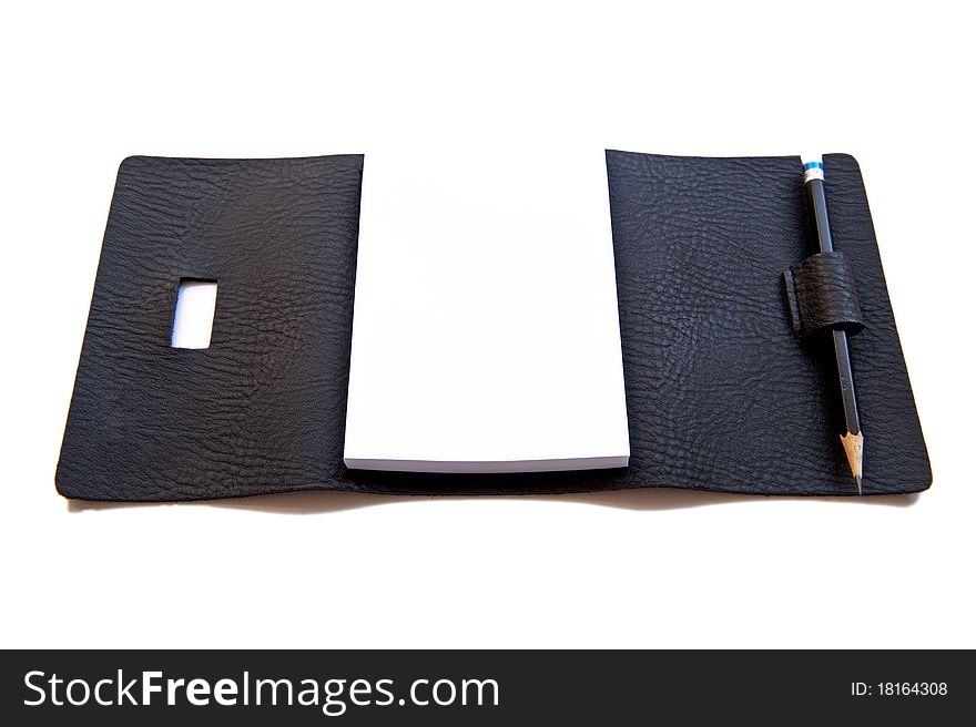 Isolated blank note book on white