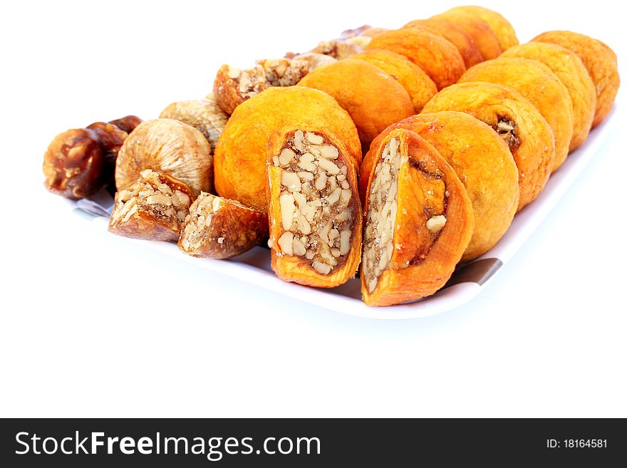 Dried fruits in tray  isolated on white background.