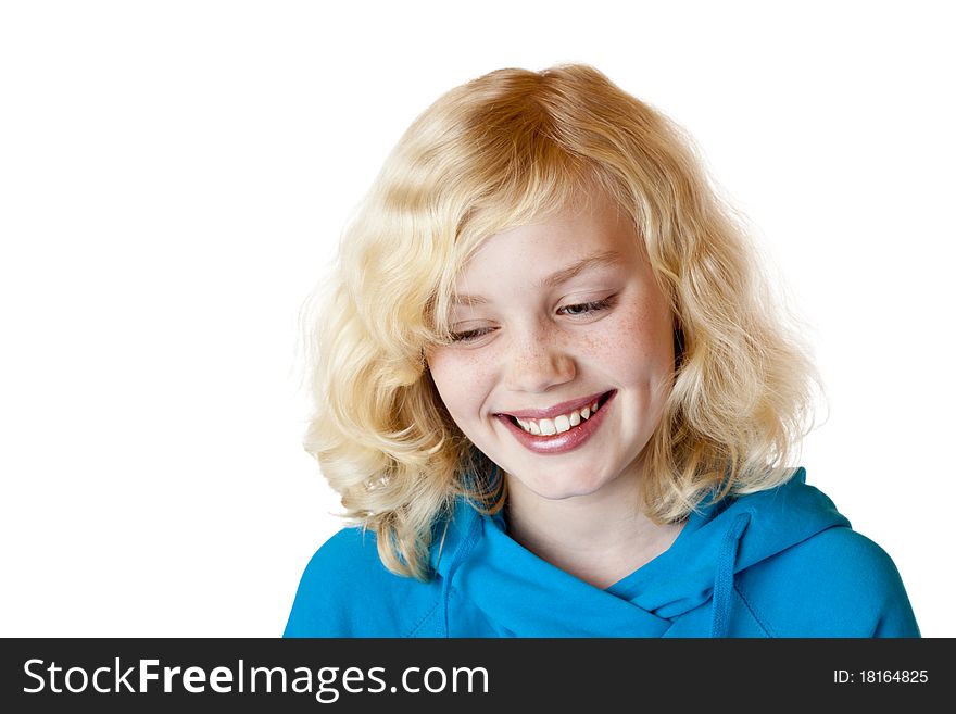 Beautiful child with blond hair smiles happy