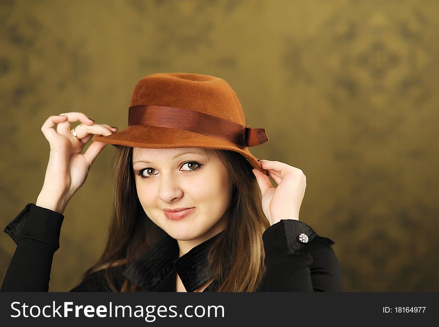 A portrait of young nice girl in studio