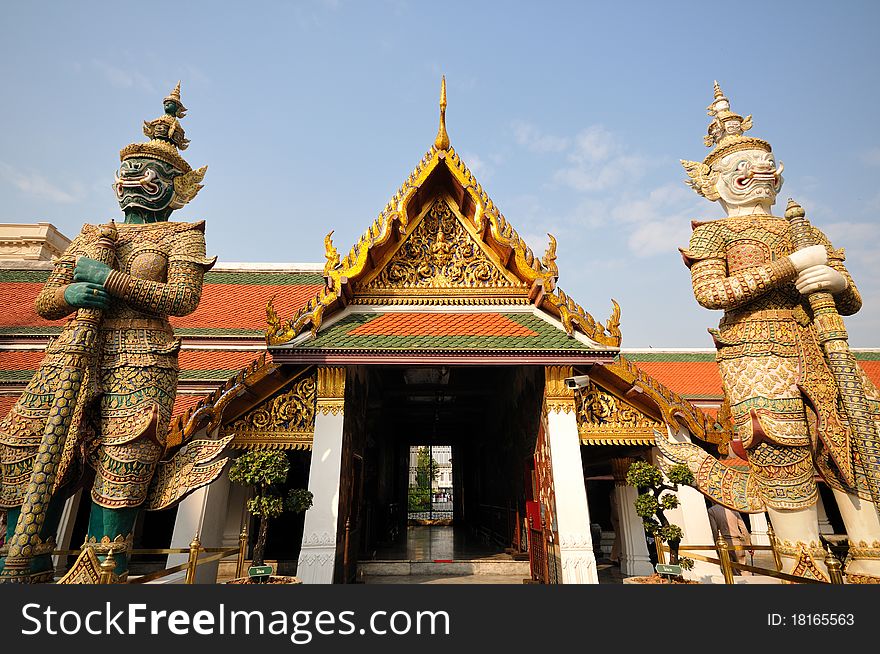 Twin guardian statues at Wat Phra-Kaew in Bangkok, Thailand