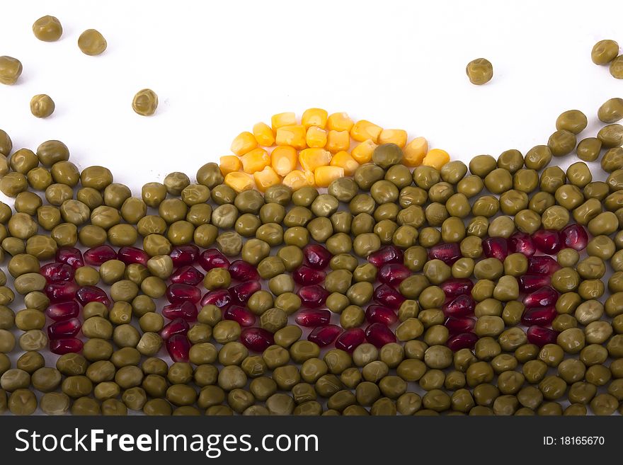 Labeled fruit made of beans from corn pomegranate and peas