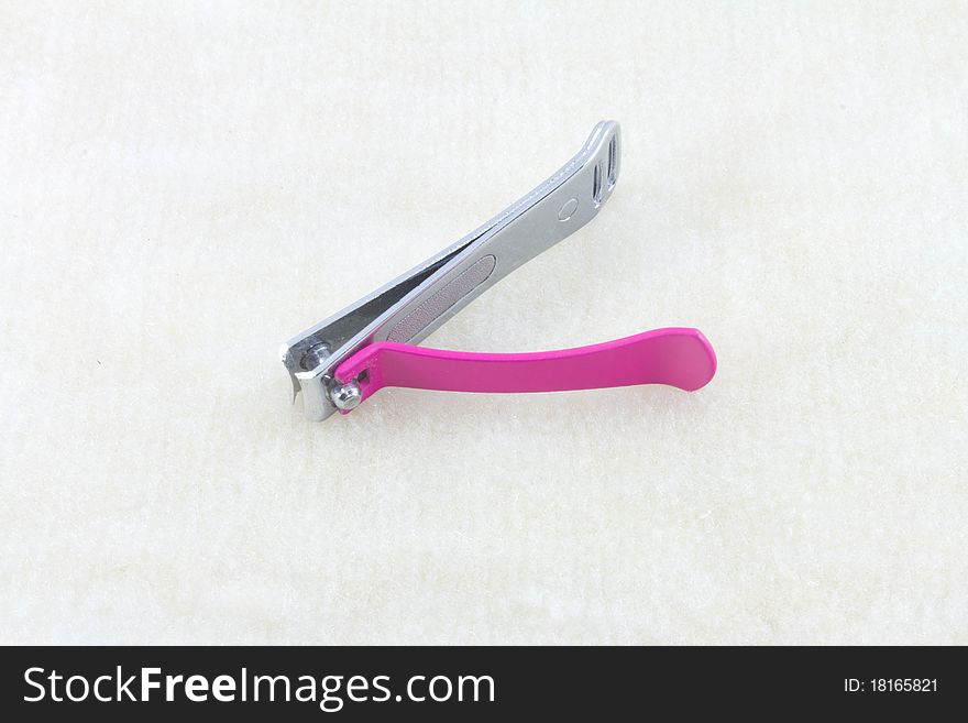 Pink nail scissors.