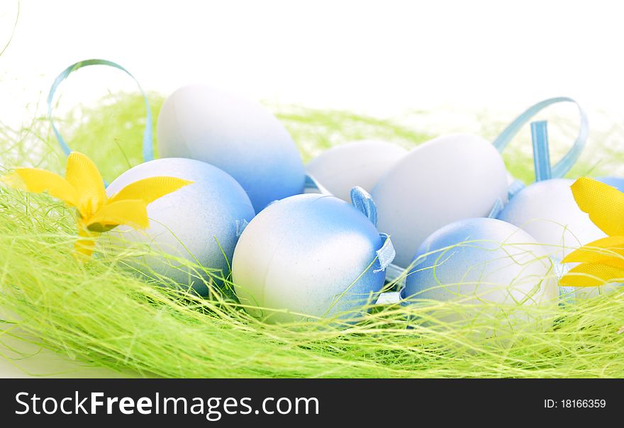 Colorful Easter Eggs on green Grass