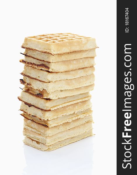 Tower of belgian waffles on white background
