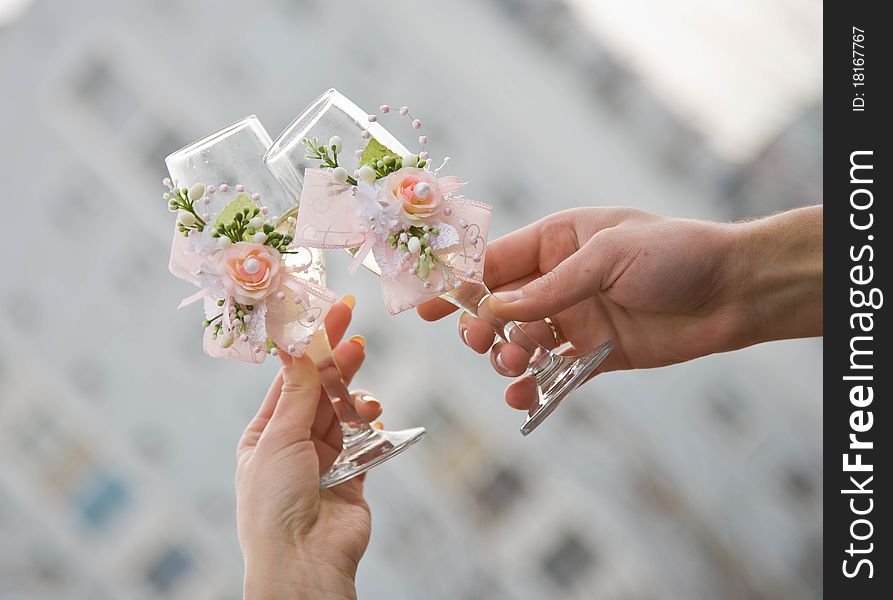 Champagne glasses with rings and flowers. Champagne glasses with rings and flowers
