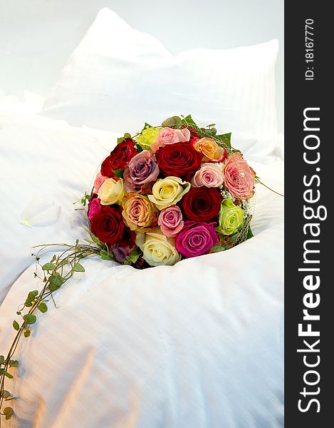 Bridal Bouquet on a bed