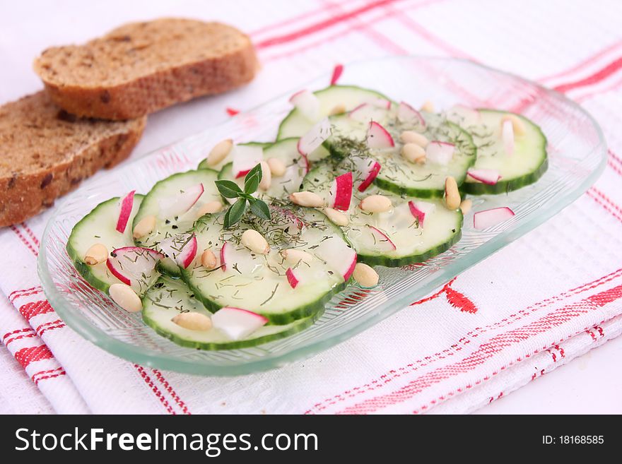 A fresh salad of cucumbers with radish