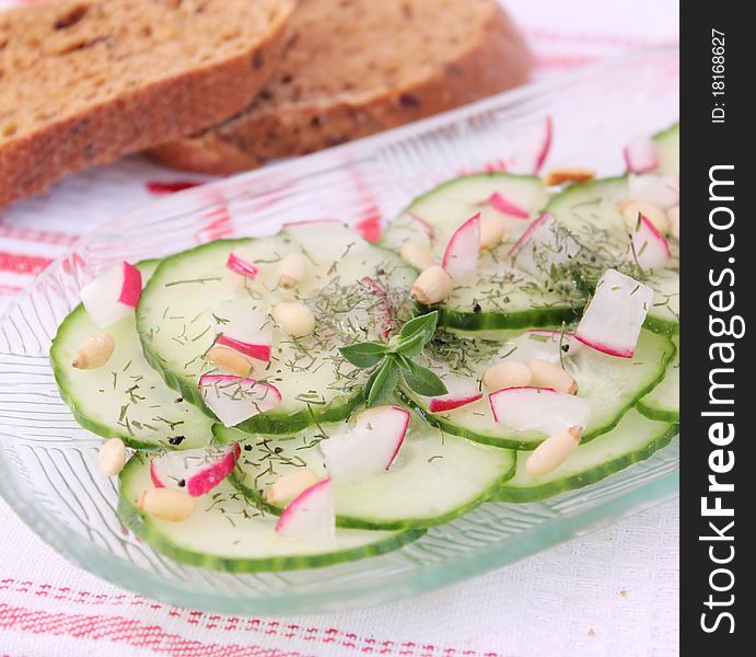 A fresh salad of cucumbers with radish