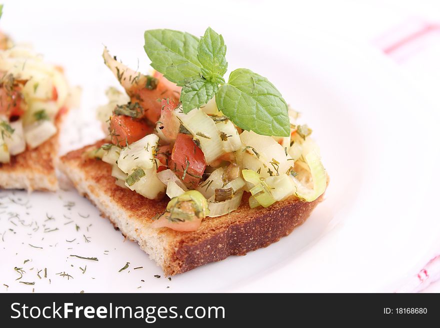 Fresh bruschetta with tomatoes and onions