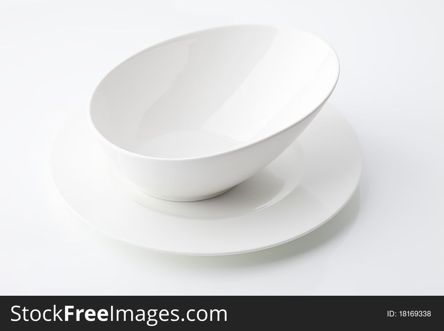 Empty white soup bowl on white background. Empty white soup bowl on white background