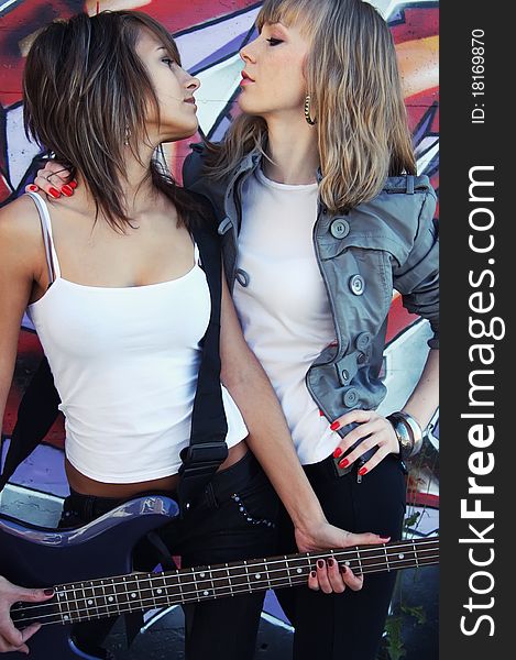 Two girls with guitar