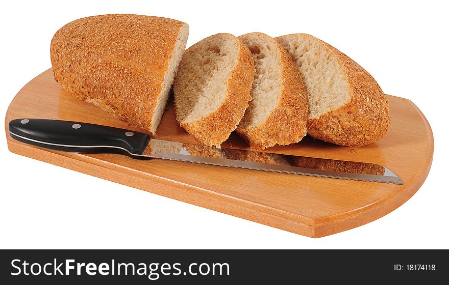 Brown bread isolated over white background with knife. Brown bread isolated over white background with knife.