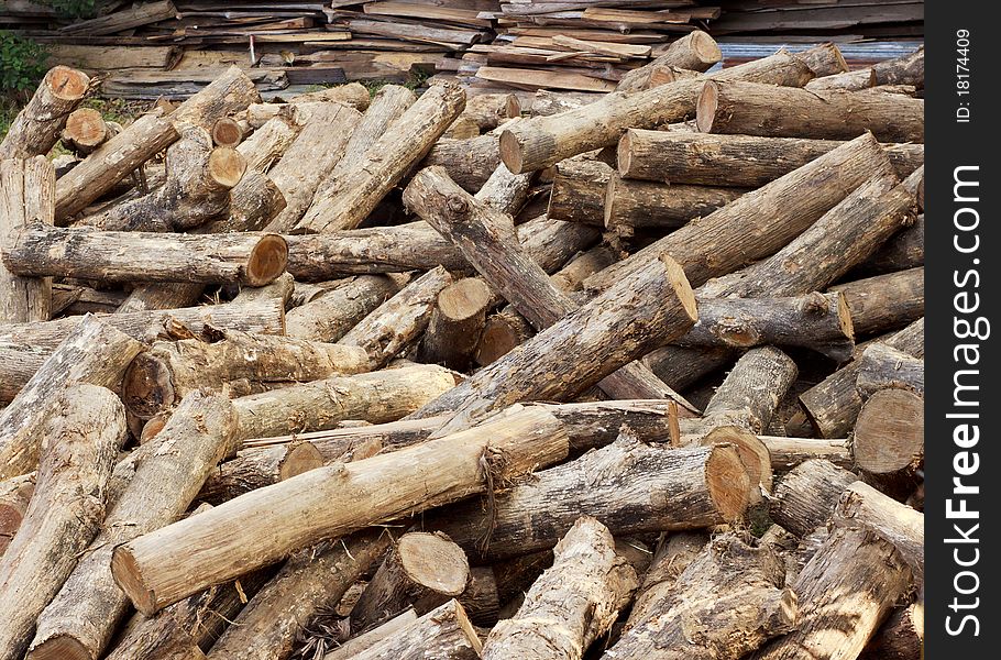 Pile of wood logs befor build.