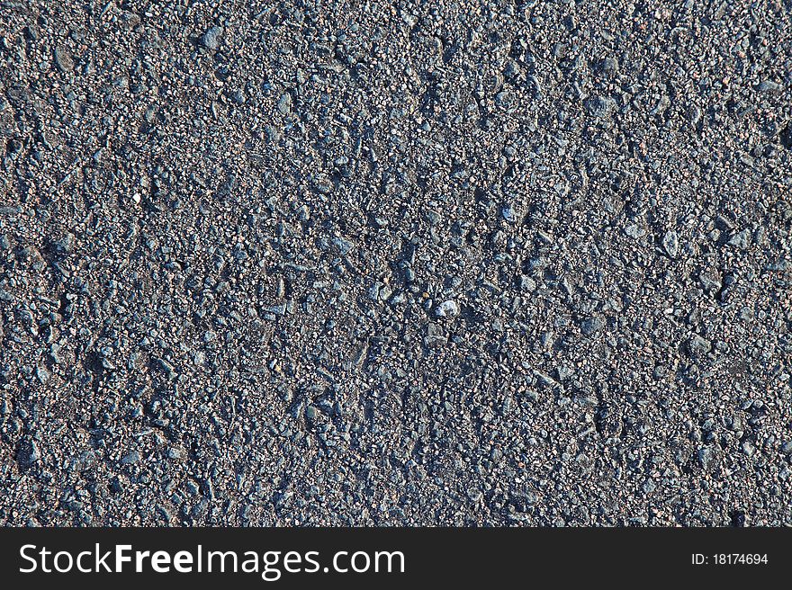 Gray asphalt as textured background.