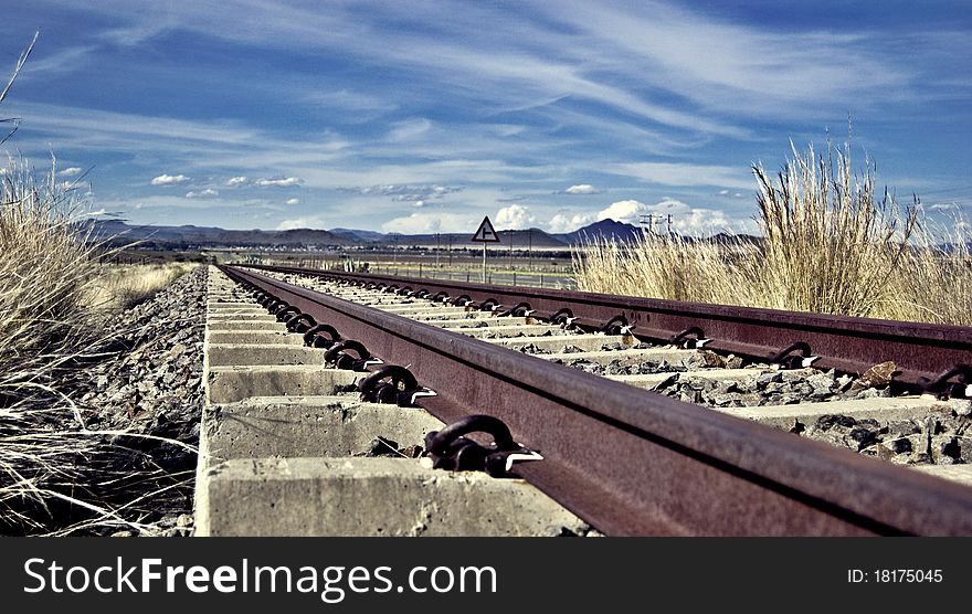 Railway with clouds and blue sky. Railway with clouds and blue sky