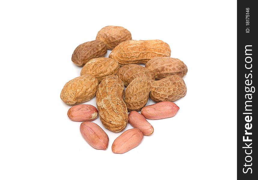 A handful of peanuts on a white background