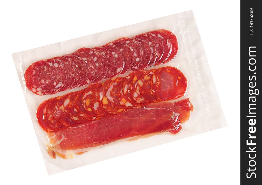 Packed meat in a plastic bag isolated over white. Packed meat in a plastic bag isolated over white.