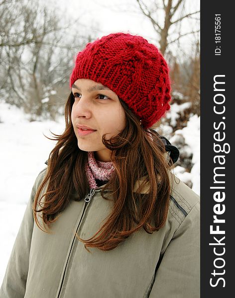 Teenage Girl In Red Cap Portrait