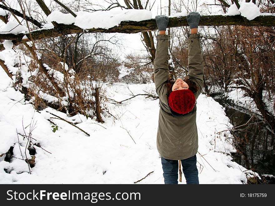 Teenage girl in snowy park