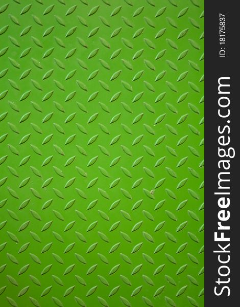 Vivid green metal plank surface