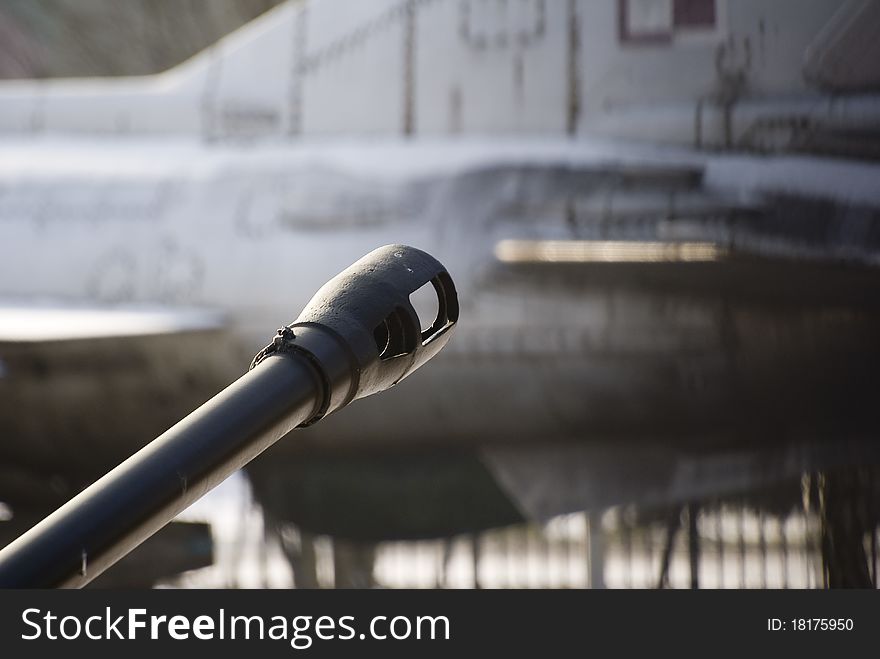 The photography of gun aimed in the direction to plane. The photography of gun aimed in the direction to plane.