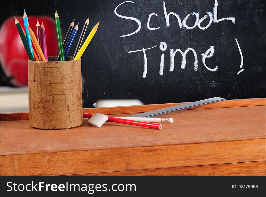 Painting desk with colors in a classroom. Painting desk with colors in a classroom.