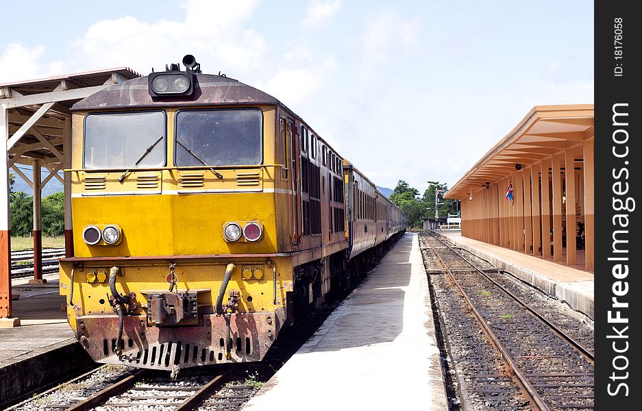 Old yellow locomotive in Thailand. Old yellow locomotive in Thailand
