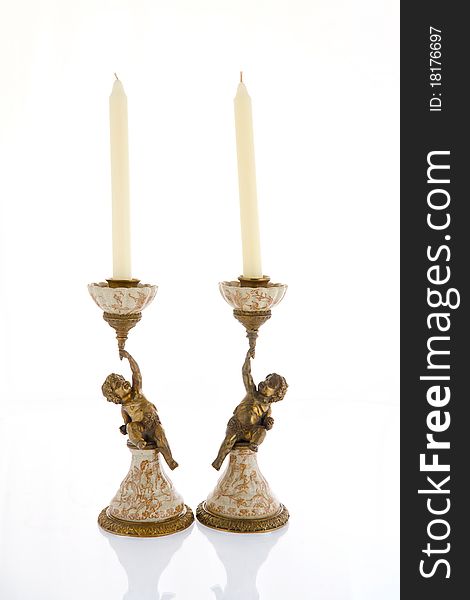 Antique candlestick on a white background. Antique candlestick on a white background