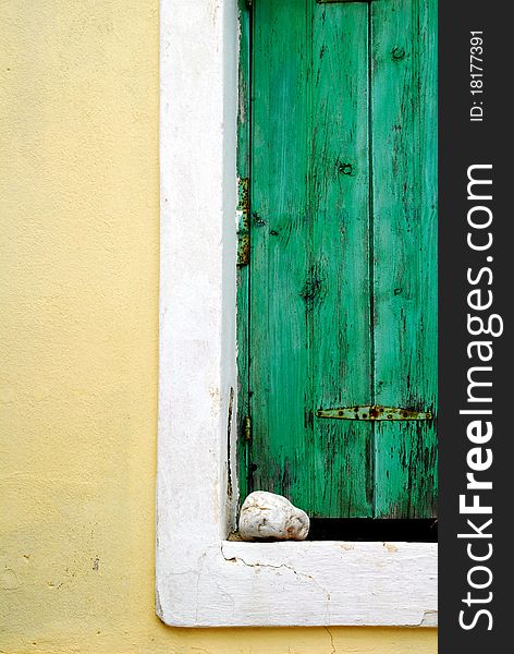 A green window in a Greek village