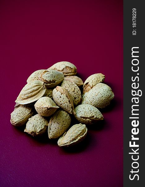 Delicious Almonds in Plain Background