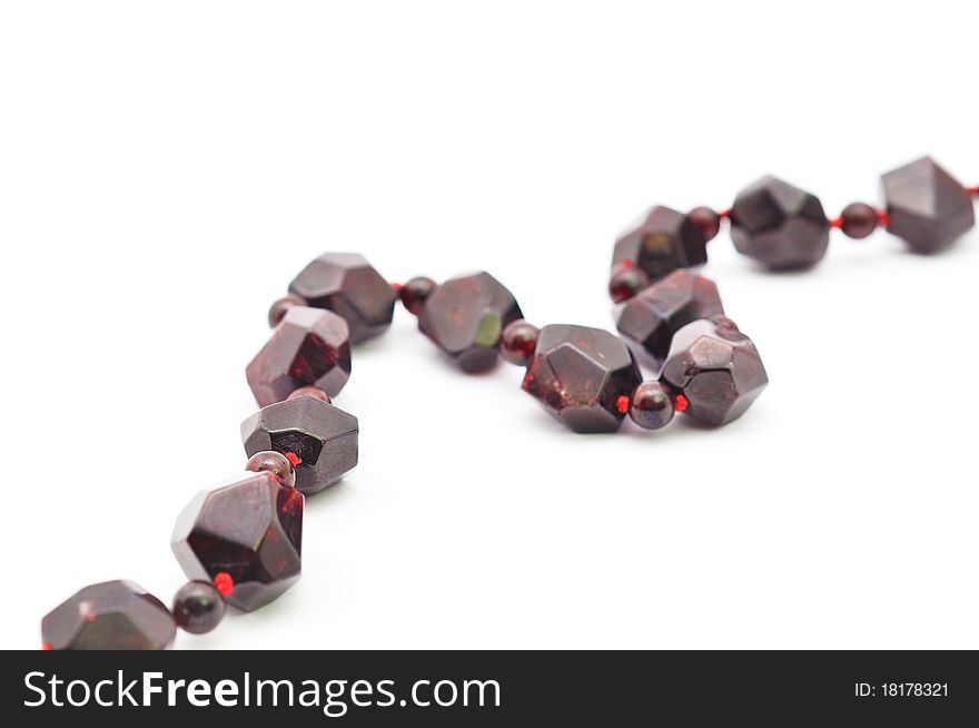 Garnet necklace isolated on a white background