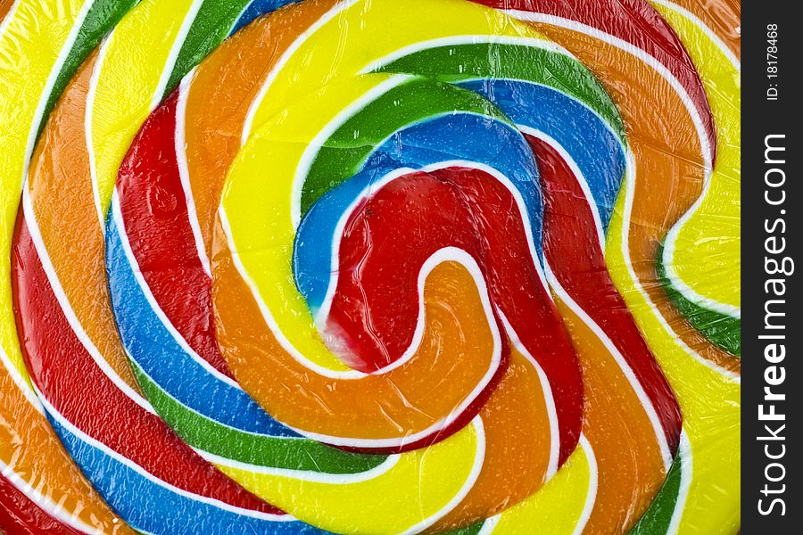 Macro of lollipop with colorful swirls