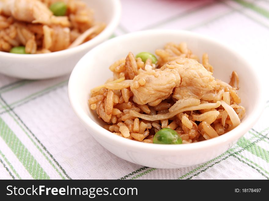 A asian meal of rice, meat and vegetables. A asian meal of rice, meat and vegetables