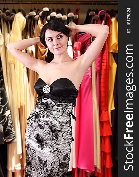 Pretty Girl Shopping at the mall, in dressing room show new dress (beautiful Girl and New Dress )