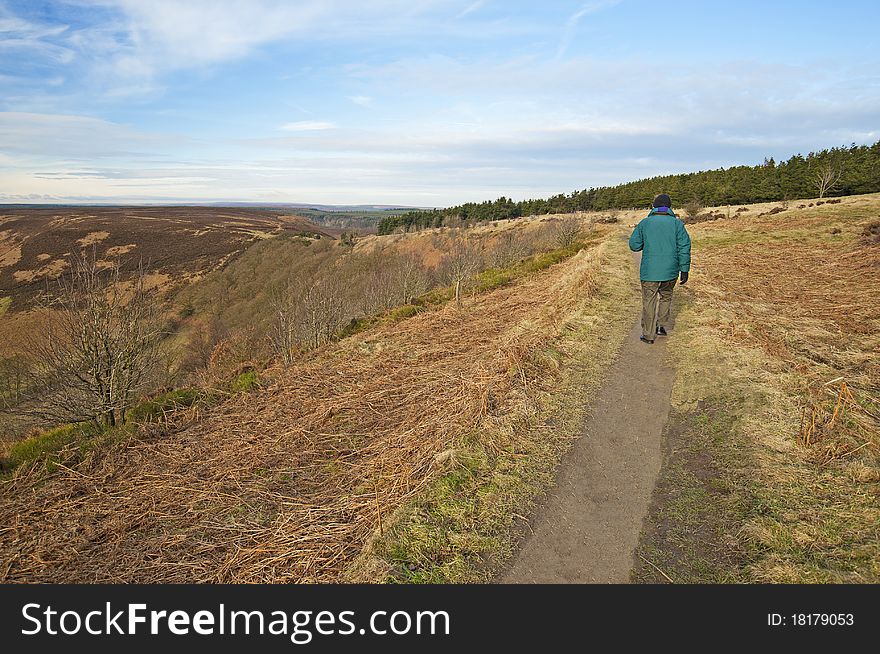 Man walking through the countryside