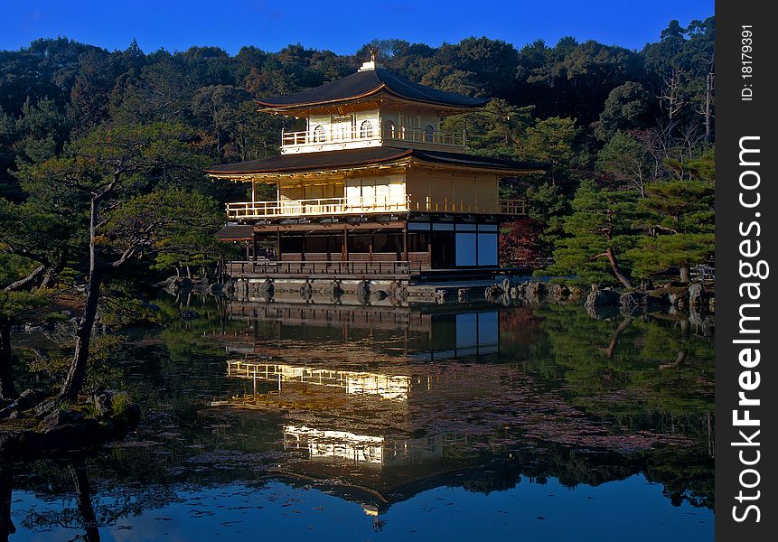 Kinkakuji temple (Golden Pavilion) at sunset in Kyoto, Japan