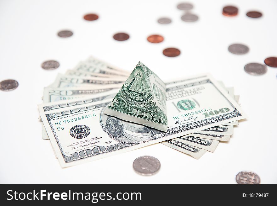Dollar pyramid on white background macro