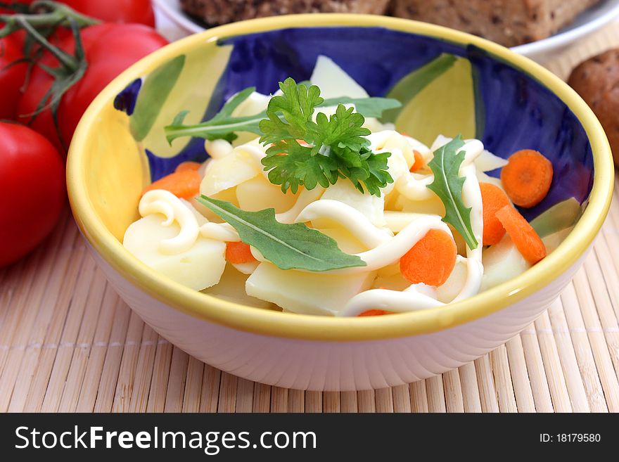 A fresh salad of potatoes with carrots