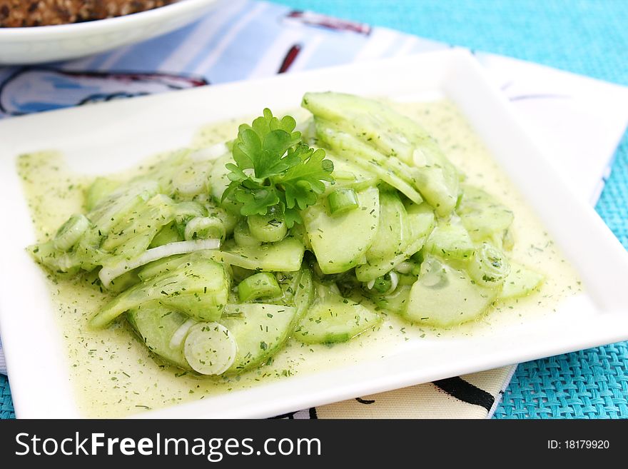Salad of cucumber on a plate. Salad of cucumber on a plate