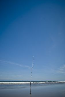 Fishing Rod At The Sand Of The Beach Stock Photography Fishing Rod At The Sand Of The Beach Stock Photography