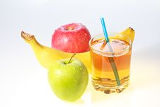 Banana, Green And Red Apples And Glass Of Juice Stock Image