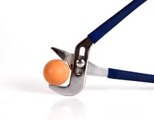 Egg Clamped In A Vise Pipe Fittings Key Royalty Free Stock Photo