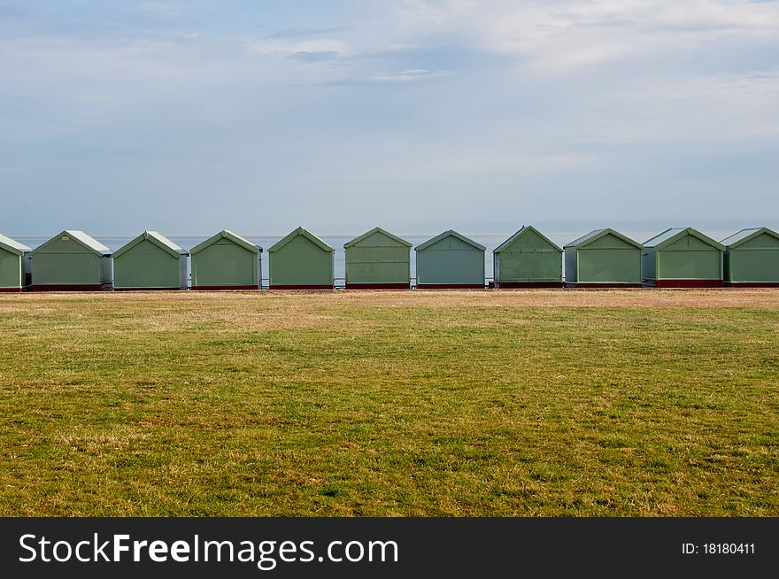 Beach Huts along promenade in Brighton, England. Beach Huts along promenade in Brighton, England