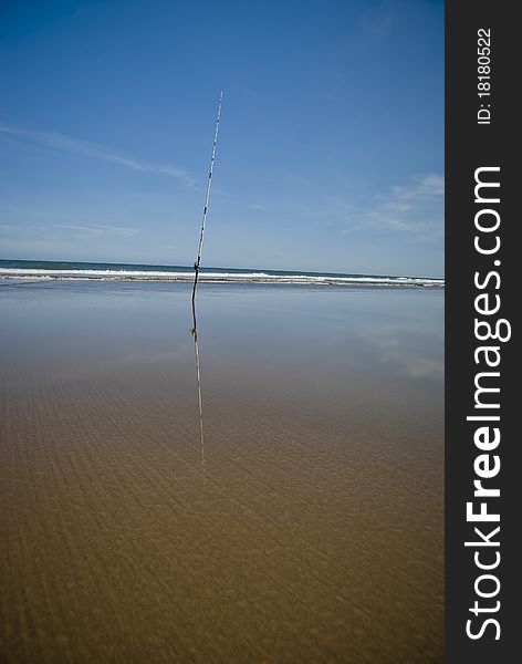 Fishing rod on the beach