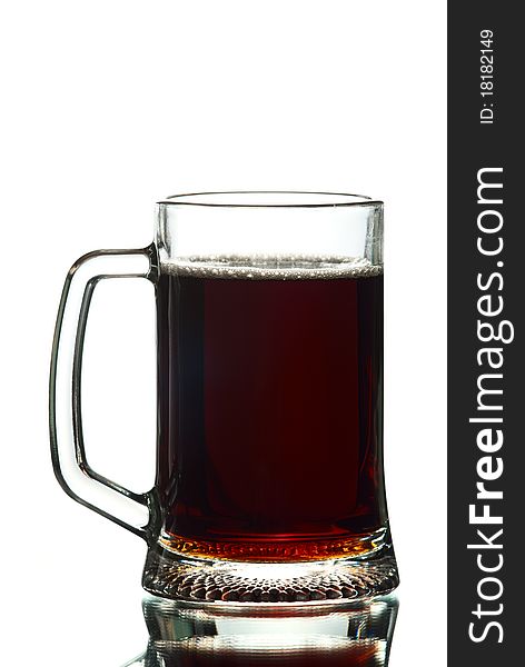 A glass of dark beer.