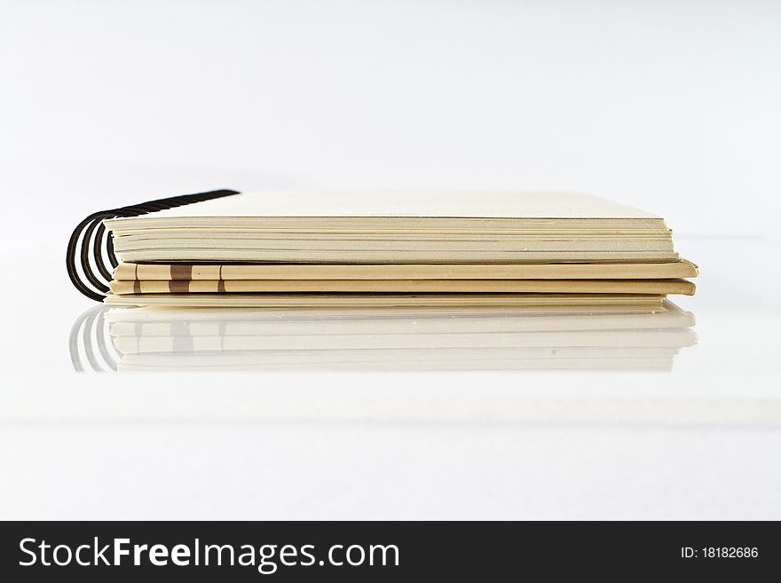 Isolated notebook on white background with shadow